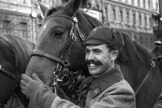 Participant in parade wearing cavalryman uniform
