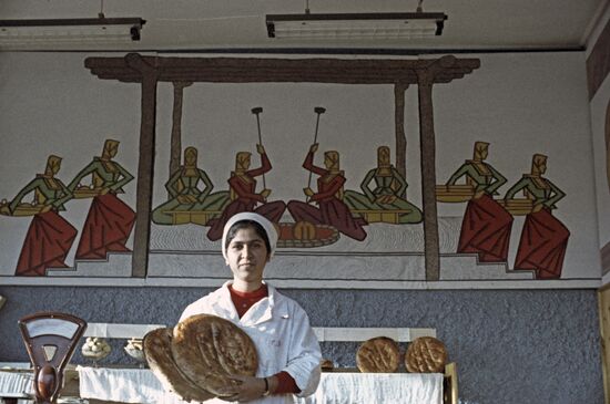 A lady selling flat Churek bread
