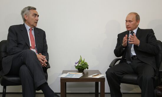 Vladimir Putin meets Peter Löscher