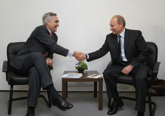 Vladimir Putin meets Peter Löscher