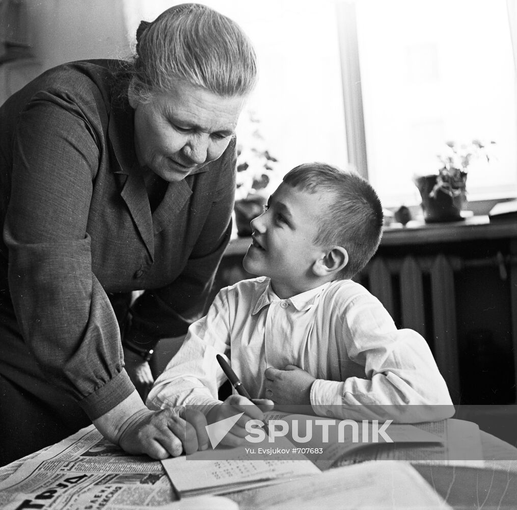 Pensioner Alexandra Nekrasova and her grandson