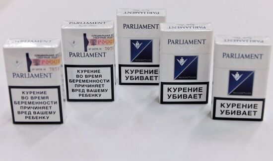 Parliament cigarettes with anti-smoking warning inscriptions
