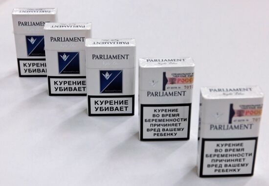 Parliament cigarettes with anti-smoking warning inscriptions