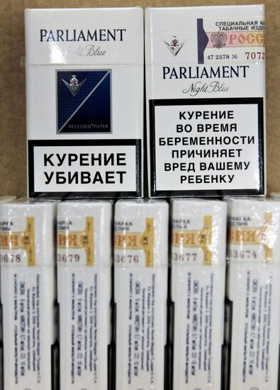 Parliament cigarettes with anti-smoking warning inscriptions