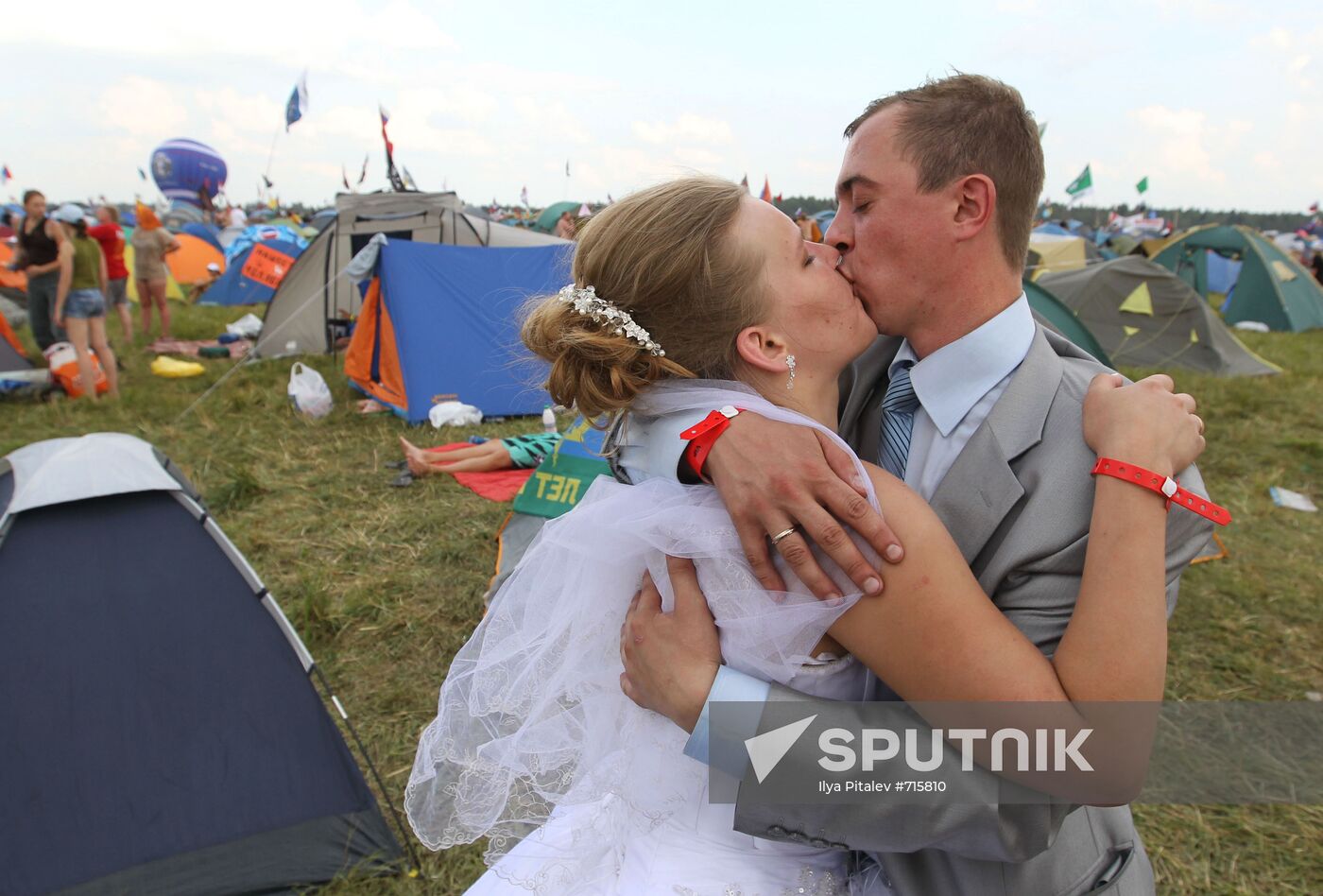 Newlyweds, rock festival visitors