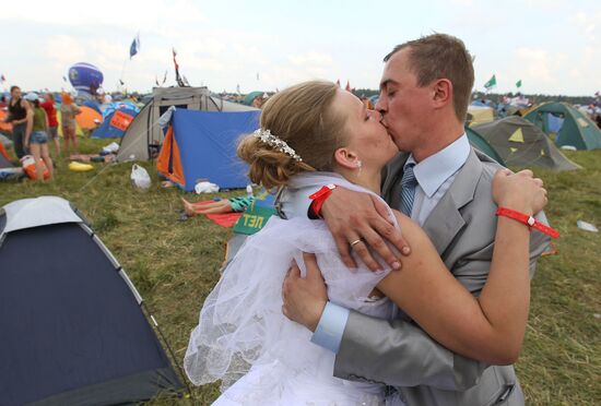 Newlyweds, rock festival visitors