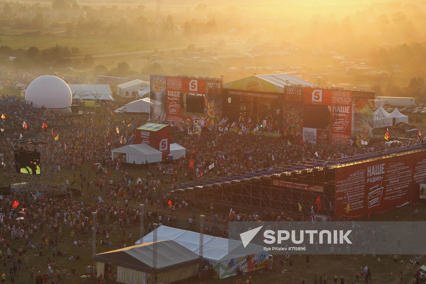 Visitors attend Nashestviye rock festival