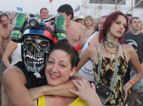 Visitors attend Nashestviye rock festival