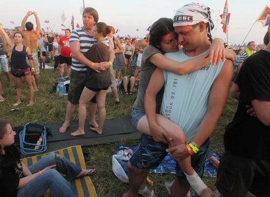 Visitors attend Nashestviye rock festival