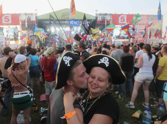 Visitors attend Nashestviye rock festival