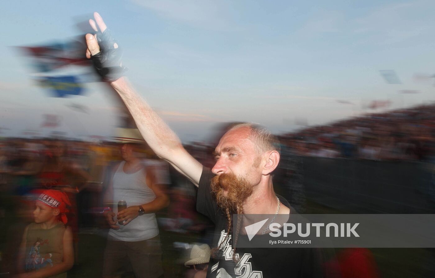 Visitors attend Nashestviye rock festival