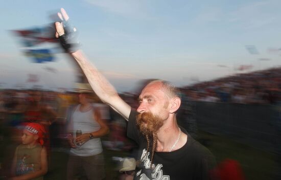 Visitors attend Nashestviye rock festival