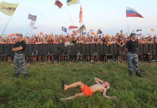 Visitors attend Nashestviye rock festival