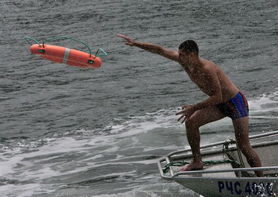 Emergency inspectors engage in lifesaving relay