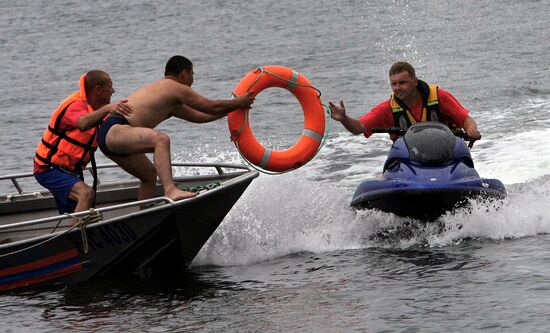 Emergency inspectors engage in lifesaving relay