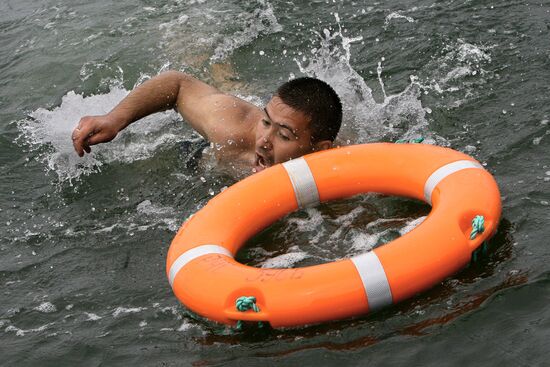 Emergency inspectors engage in lifesaving relay