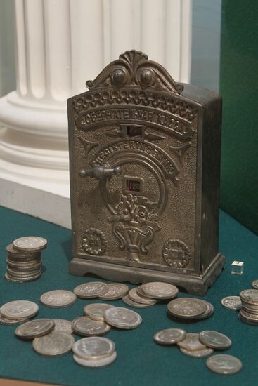 money-box and coins