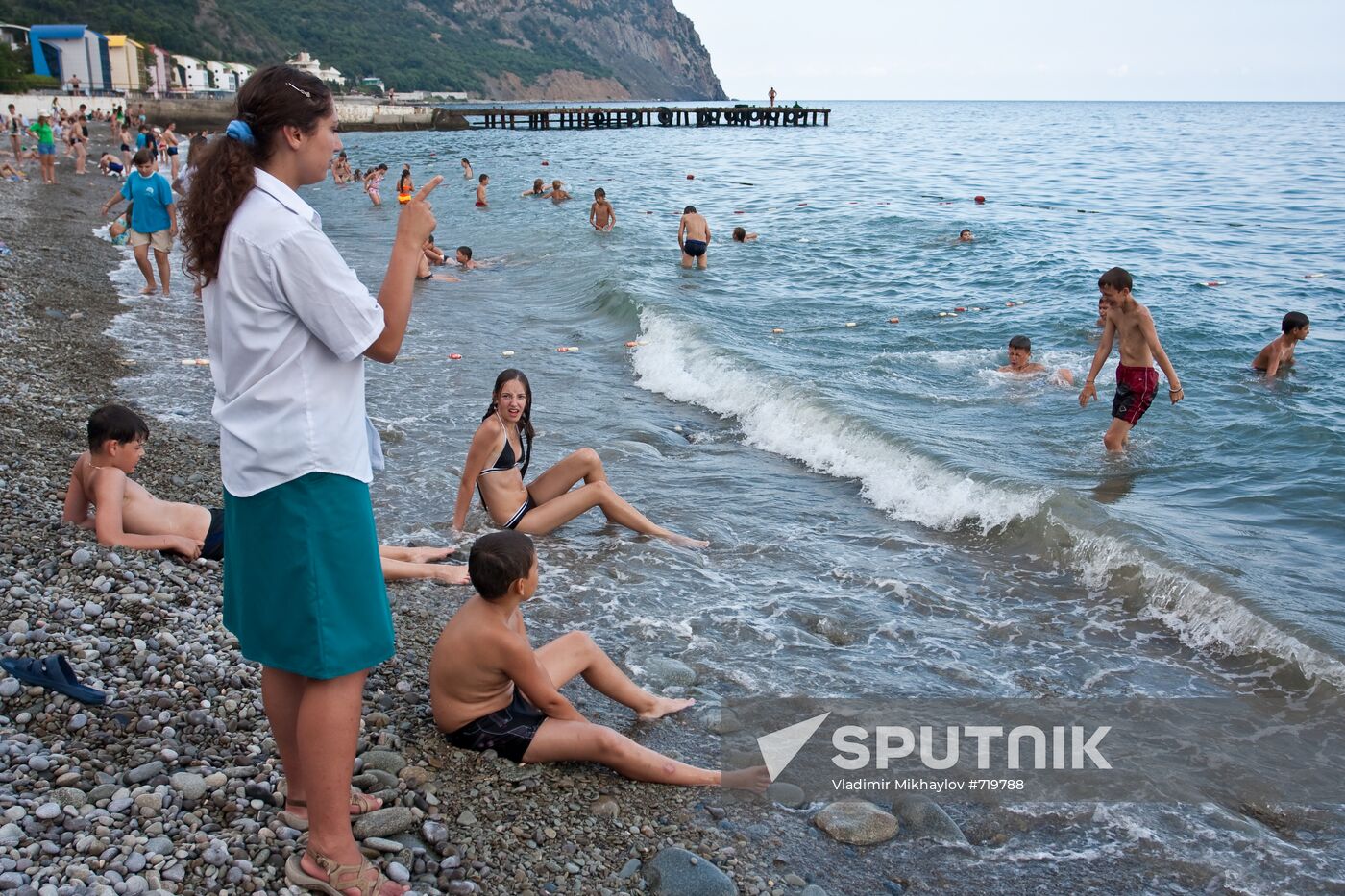 Tutor watching for swimming children