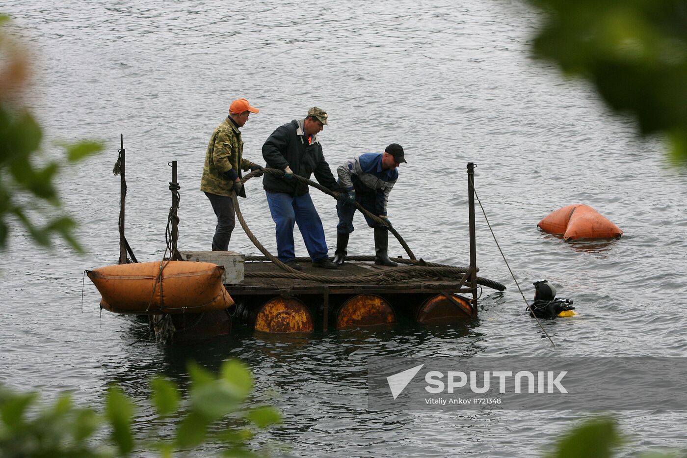 Utility crews engage in boat debris cleanup at Novik Bay