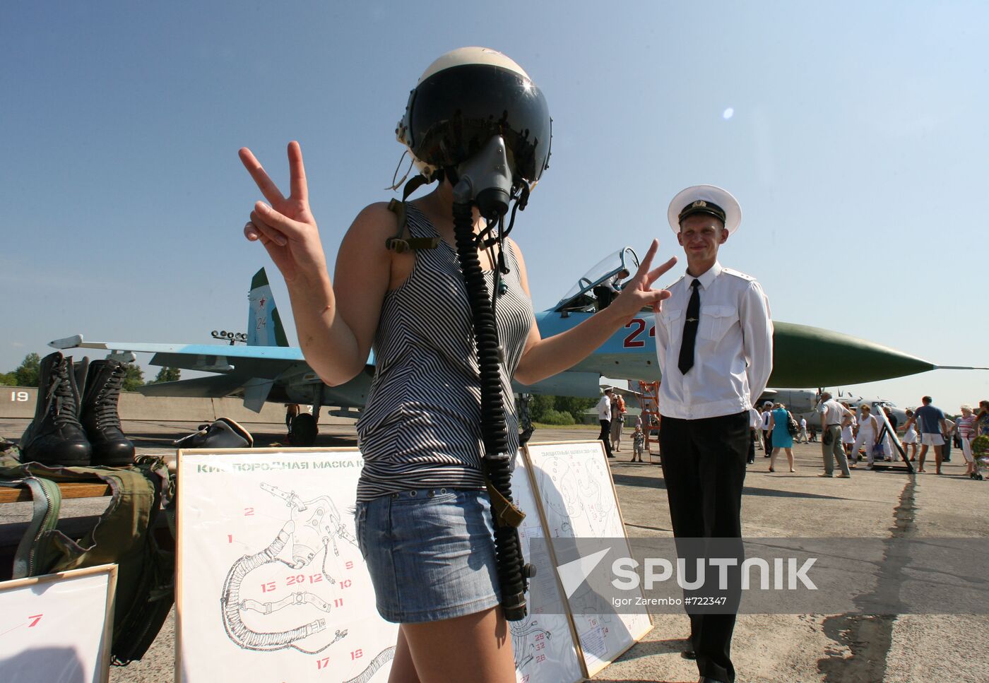 Visitors attend military aircraft exhibition