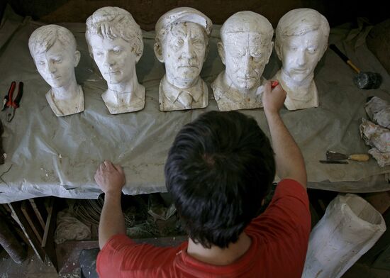 The Diamond Arm characters being cast in bronze