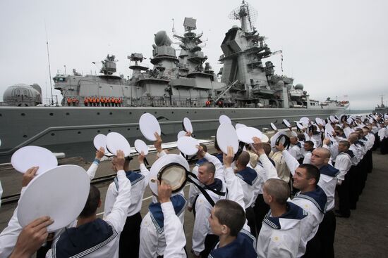 Sailors bidding farewell to the Peter the Great cruiser