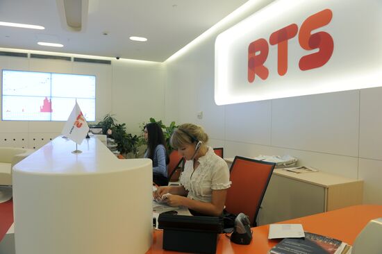 Employees in RTS stock exchange new office