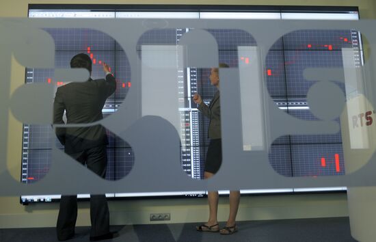 Employees in RTS stock exchange new office