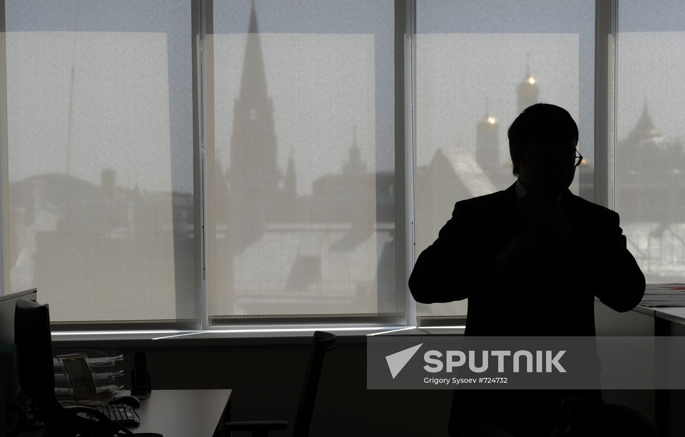 Employee in RTS stock exchange new office