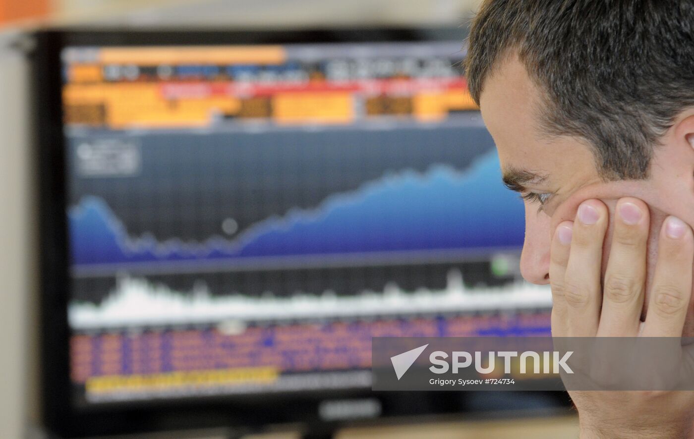 Employee in RTS stock exchange new office