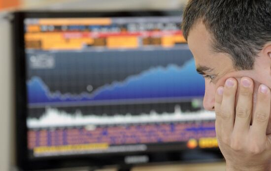 Employee in RTS stock exchange new office