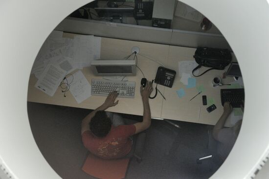 Employee in RTS stock exchange new office