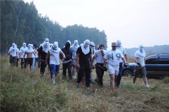 Unidentified masked men in Khimki forest