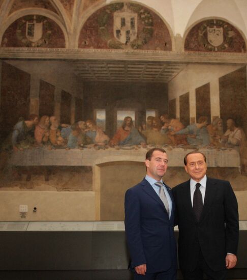 Dmitry Medvedev and Silvio Berlusconi take walk in Milan