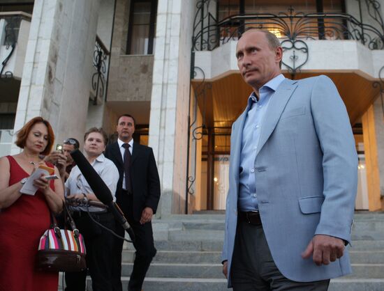 Vladimir Putin speaks to journalists