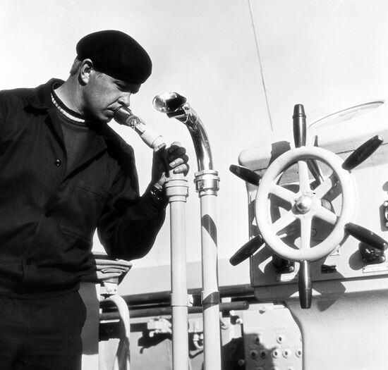 Sailor on captain's bridge
