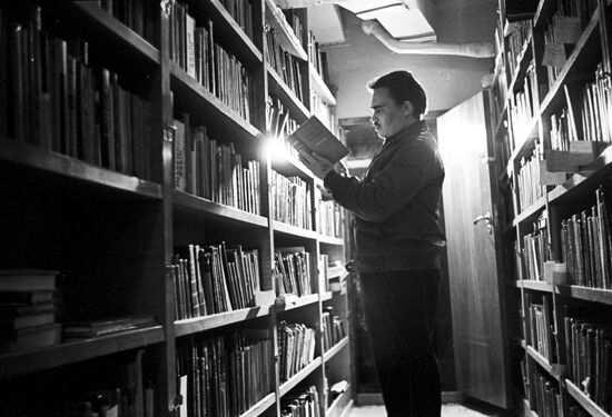 Electrician A.Orlov in a library