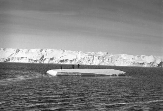 Icebergs near housing complex Mirny