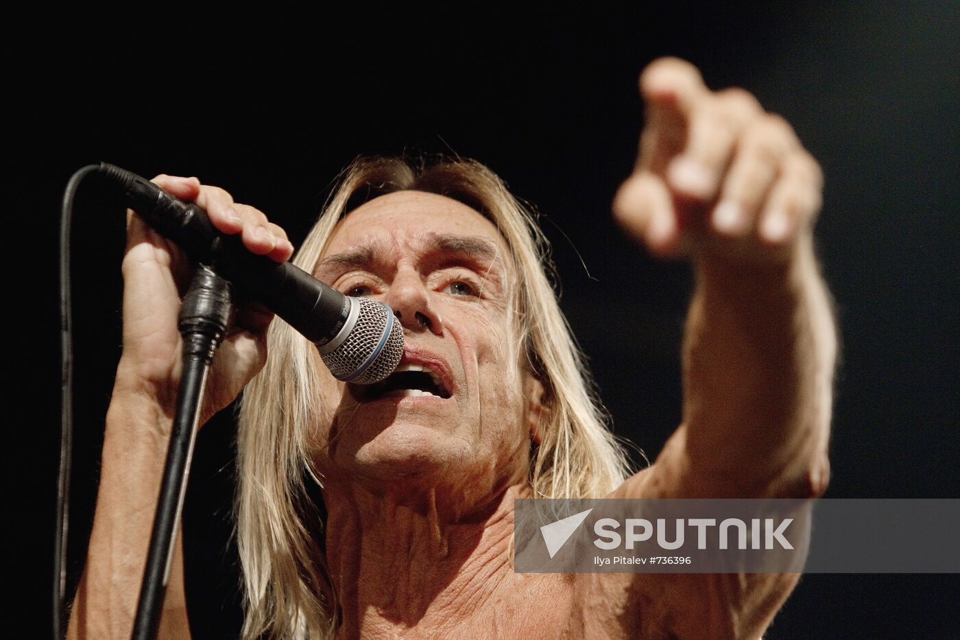 American singer Iggy Pop and his band The Stooges perform live