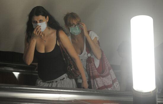 Masked residents in the Moscow underground