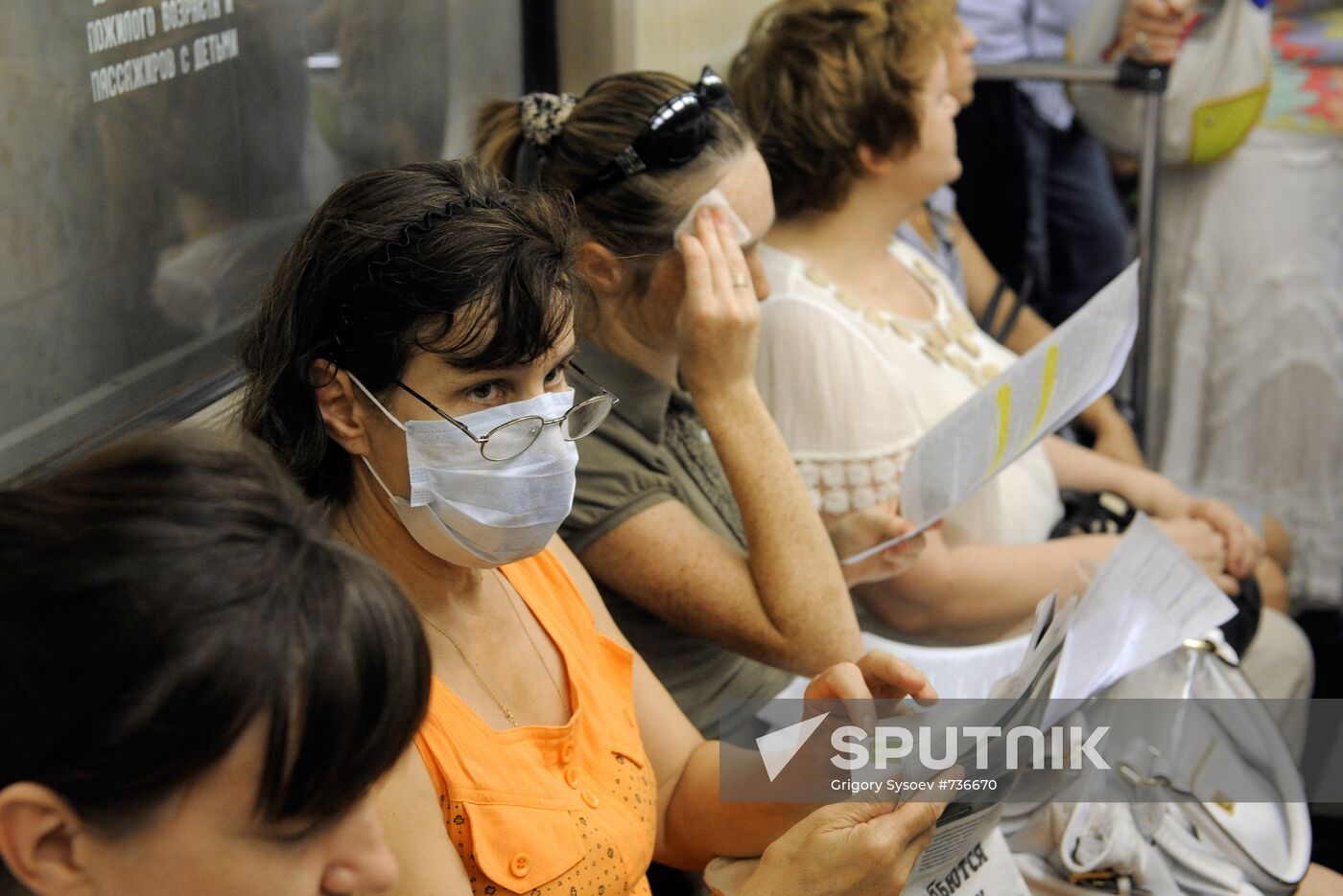 Masked residents in the Moscow underground