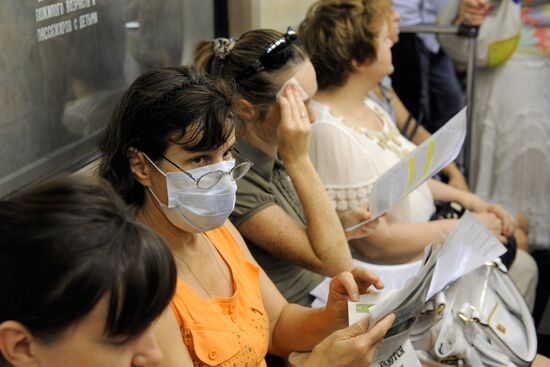 Masked residents in the Moscow underground