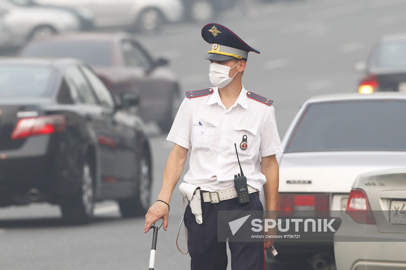 Traffic police officers in gas masks