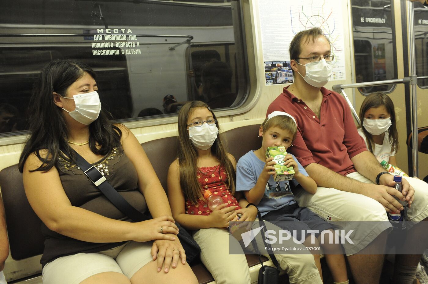 Passengers in gas masks