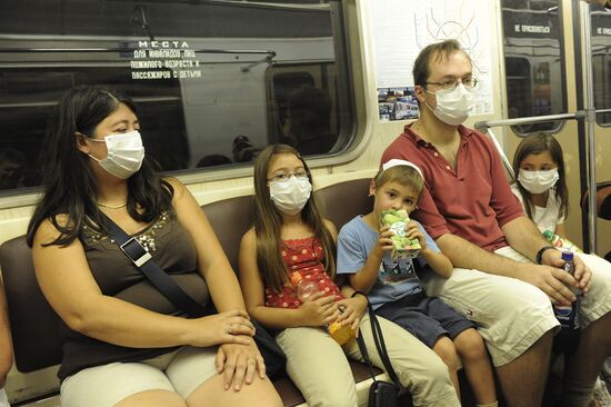 Passengers in gas masks