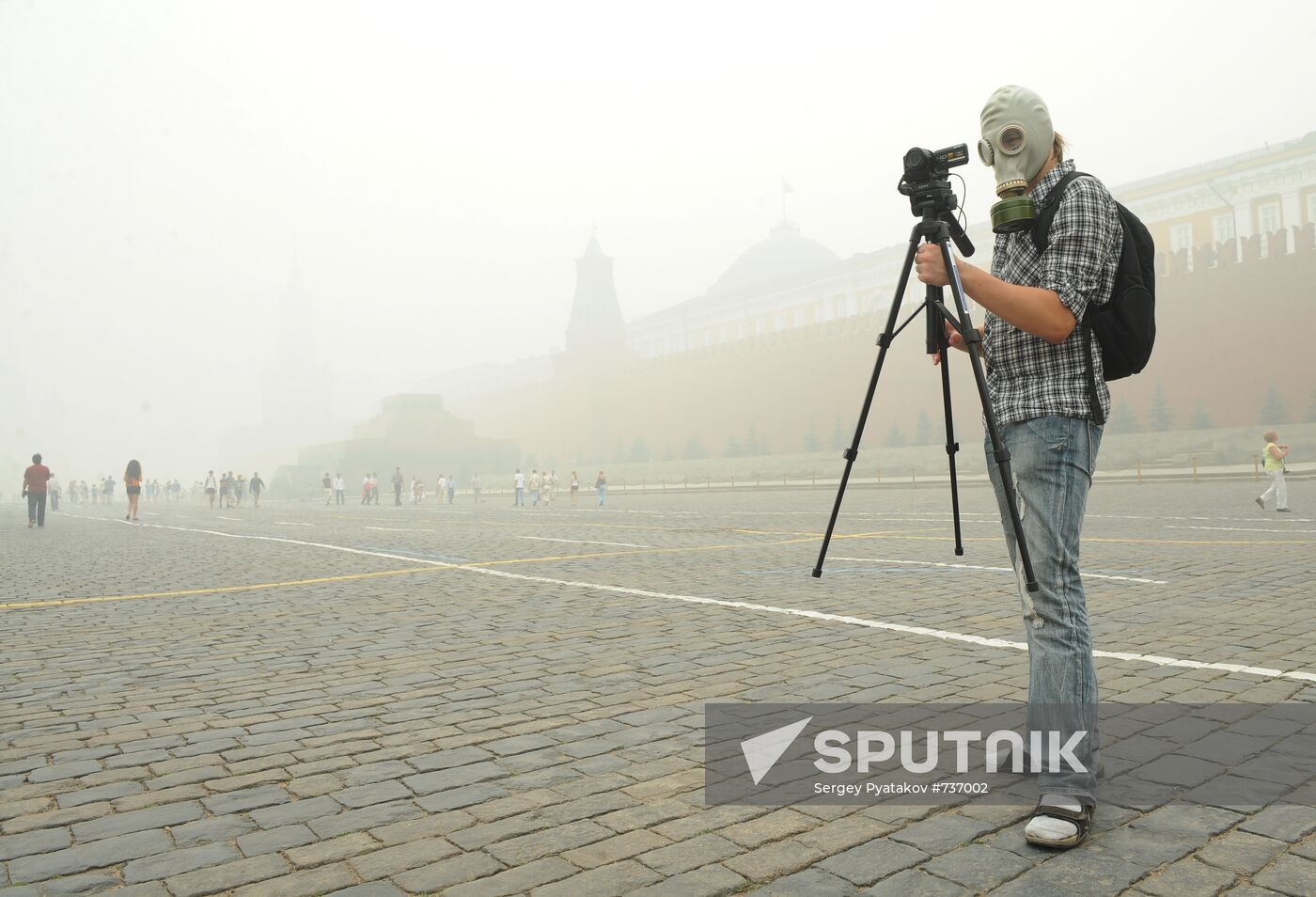 City resident in gas mask