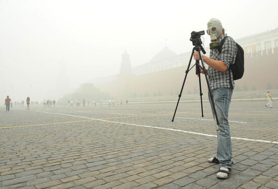 City resident in gas mask