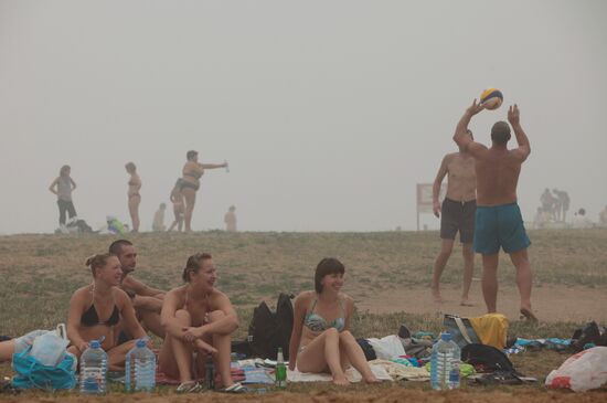Muscovites on beach in Strogino