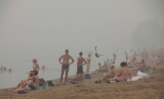 Muscovites on beach in Strogino