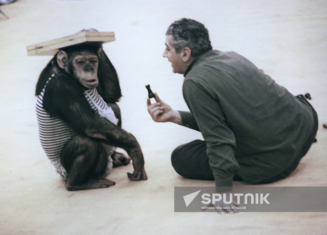 Animal tamer Stepan Isaakyan with Ricky the monkey